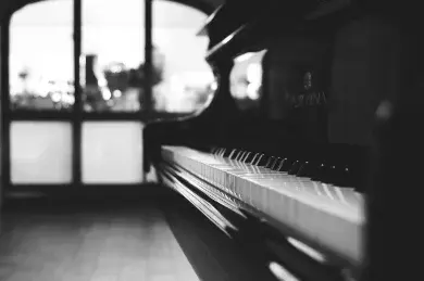 Piano in front of a window